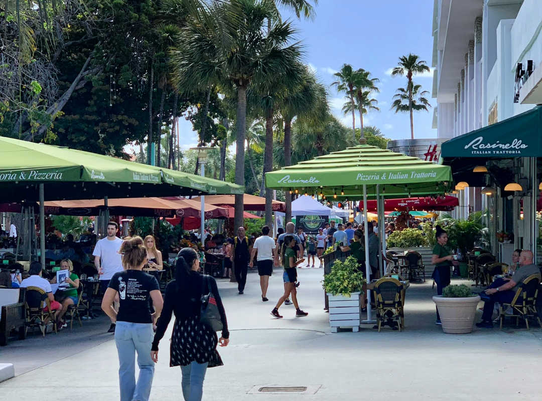 Visitors strolling Lincoln Road in South Beach